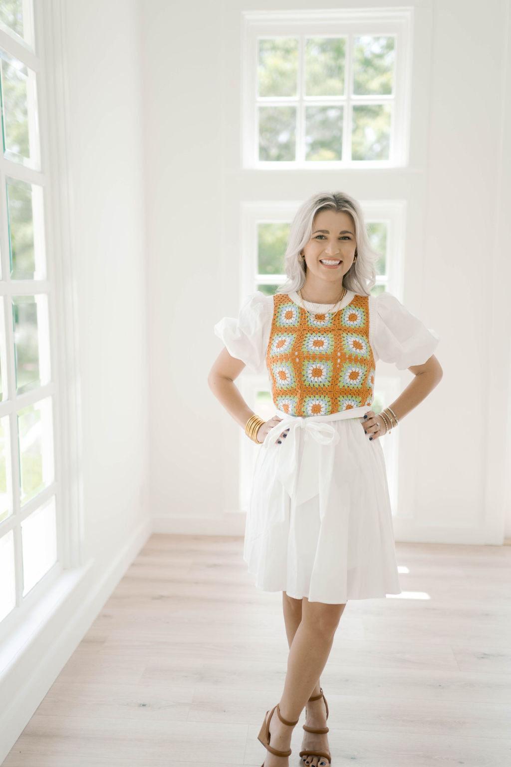 Get ready to turn heads in the Tulum Please Dress! This woven mini dress features a round neckline and short puff sleeves for a feminine touch. The crochet overlay adds a whimsical element to the bodice, while the elasticized waist and self sash belt provide a flattering silhouette. Complete with a full skirt and back neck button closure, this dress is perfect for any occasion.