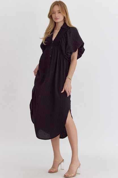 Slip into ultimate comfort and style with our Comfy &amp; Casual Dress! This midi dress features textured fabric, a flattering v-neckline, and playful bubble sleeves. The smocking detail at the chest adds a touch of charm, while the side slit and elastic cuffs provide a comfortable fit. Perfect for any occasion, this dress is lightweight and semi-sheer, making it a must-have for any wardrobe.