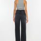 super-stretchy vintage-inspired High Waist Kan Can Jeans! With a zipper fly and 90s-inspired wide leg, modern black jean