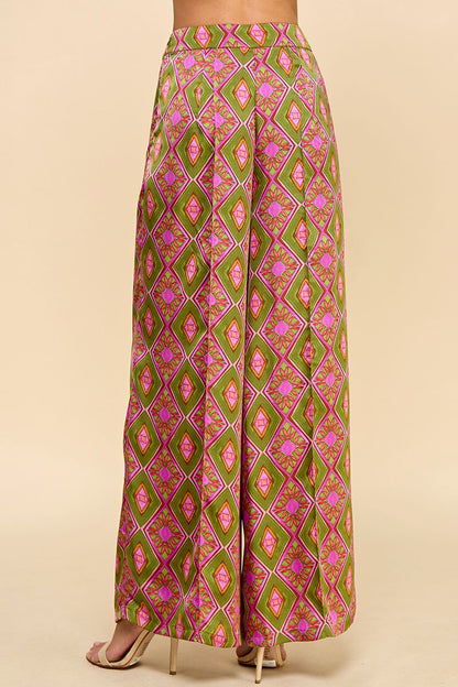 Elevate your style with Chic Harvest Pants! These high waisted, full length pants feature an eye-catching abstract print, making them a stylish addition to any wardrobe. With a flattering fit and comfortable design, these pants are perfect for any occasion. Make a statement and feel confident wearing Chic Harvest Pants!