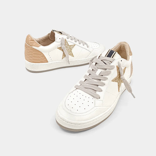 PAZ is one of our favorite must-have retro sneaker, with a low top upper body crafted in faux leather, synthetic snakeskin and glitter in contrasting white and taupe accents. These look amazing paired with shorts, cropped jeans and dresses.