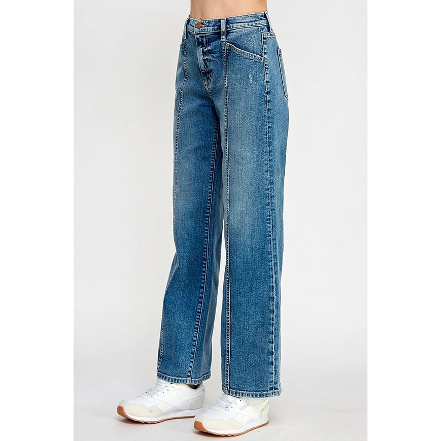 Discover the ultimate in comfort and style with our Leddi Jeans. These high rise, wide leg jeans are crafted with a stretchy fabric for all-day comfort. The medium wash adds a touch of effortless cool, while the center seam detail creates a slimming effect. Elevate your denim game today!