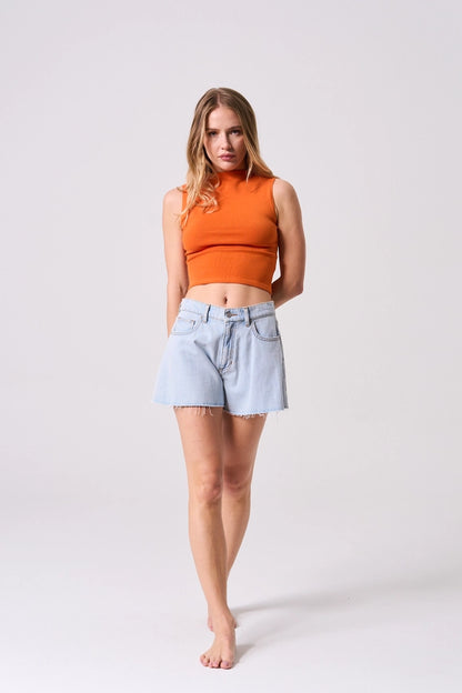 These Casual Ease Shorts are the perfect blend of comfort and style. The flare bell design adds a playful touch, while the raw cut hem keeps things edgy. Made with a light wash, these shorts are effortlessly chic. (Better than your average pair of denim shorts!)