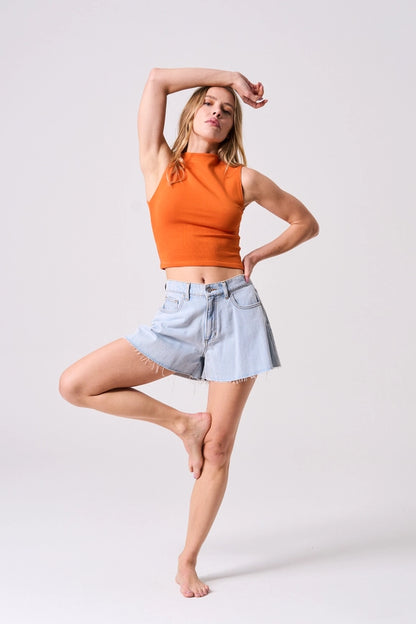 These Casual Ease Shorts are the perfect blend of comfort and style. The flare bell design adds a playful touch, while the raw cut hem keeps things edgy. Made with a light wash, these shorts are effortlessly chic. (Better than your average pair of denim shorts!)