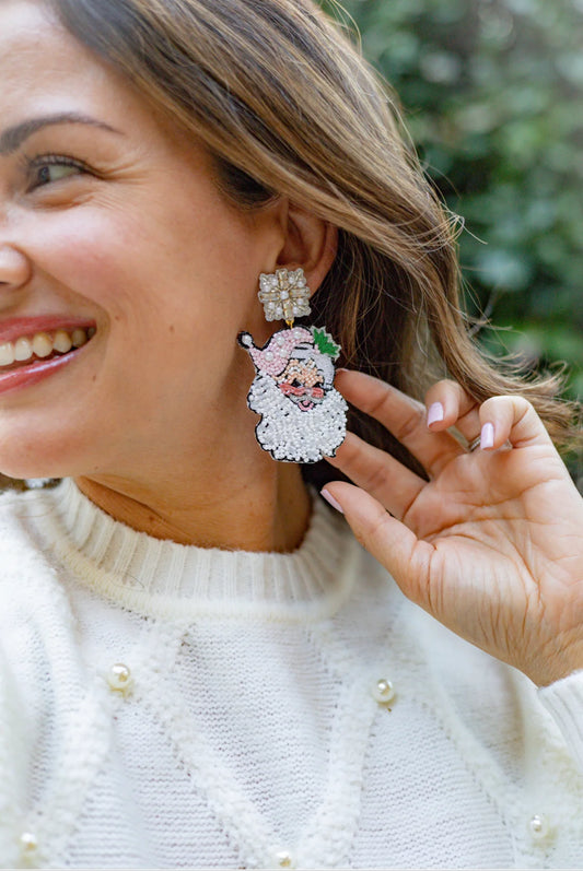 Happy Ho Ho Holidays!!! Celebrate Christmas with the cutest beaded Vintage Pink Santa Claus Earrings. The craftsmanship on this piece is very unique!  We hope you love it as much as we do.  Length 2.5” Width 1.7” Very Lightweight