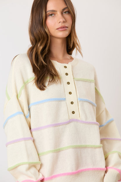 Wrap yourself in the vibrant colors of our Favorite Time Sweater! Featuring a charming multi-color stripe design and adorable buttons, this sweater will add a pop of personality to any outfit. Stay warm and stylish all day long!