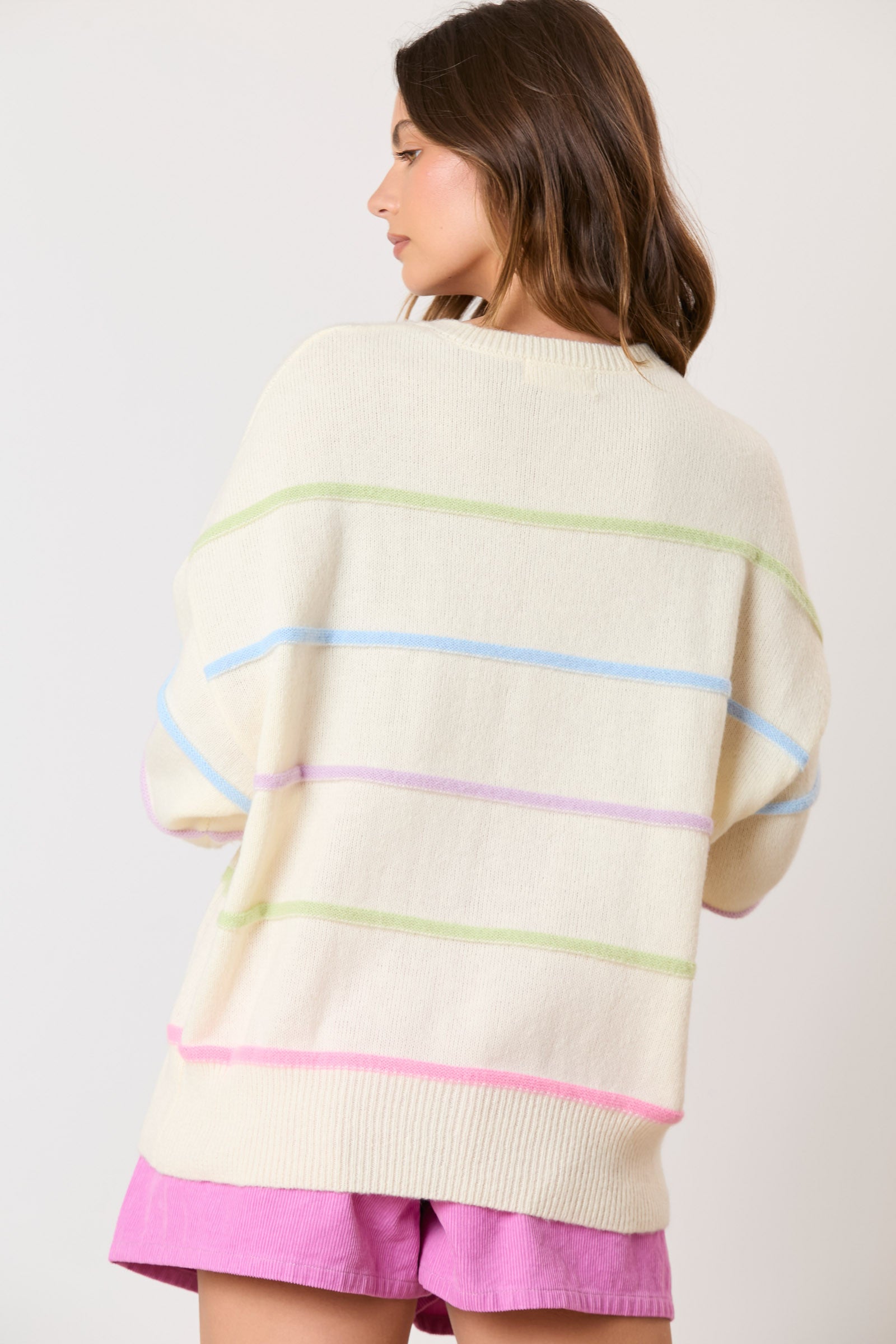 Wrap yourself in the vibrant colors of our Favorite Time Sweater! Featuring a charming multi-color stripe design and adorable buttons, this sweater will add a pop of personality to any outfit. Stay warm and stylish all day long!