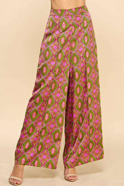 Elevate your style with Chic Harvest Pants! These high waisted, full length pants feature an eye-catching abstract print, making them a stylish addition to any wardrobe. With a flattering fit and comfortable design, these pants are perfect for any occasion. Make a statement and feel confident wearing Chic Harvest Pants!